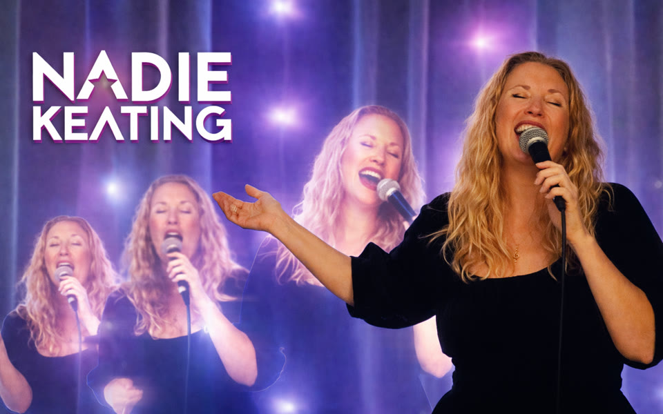 Nadie Keating singing solo on stage